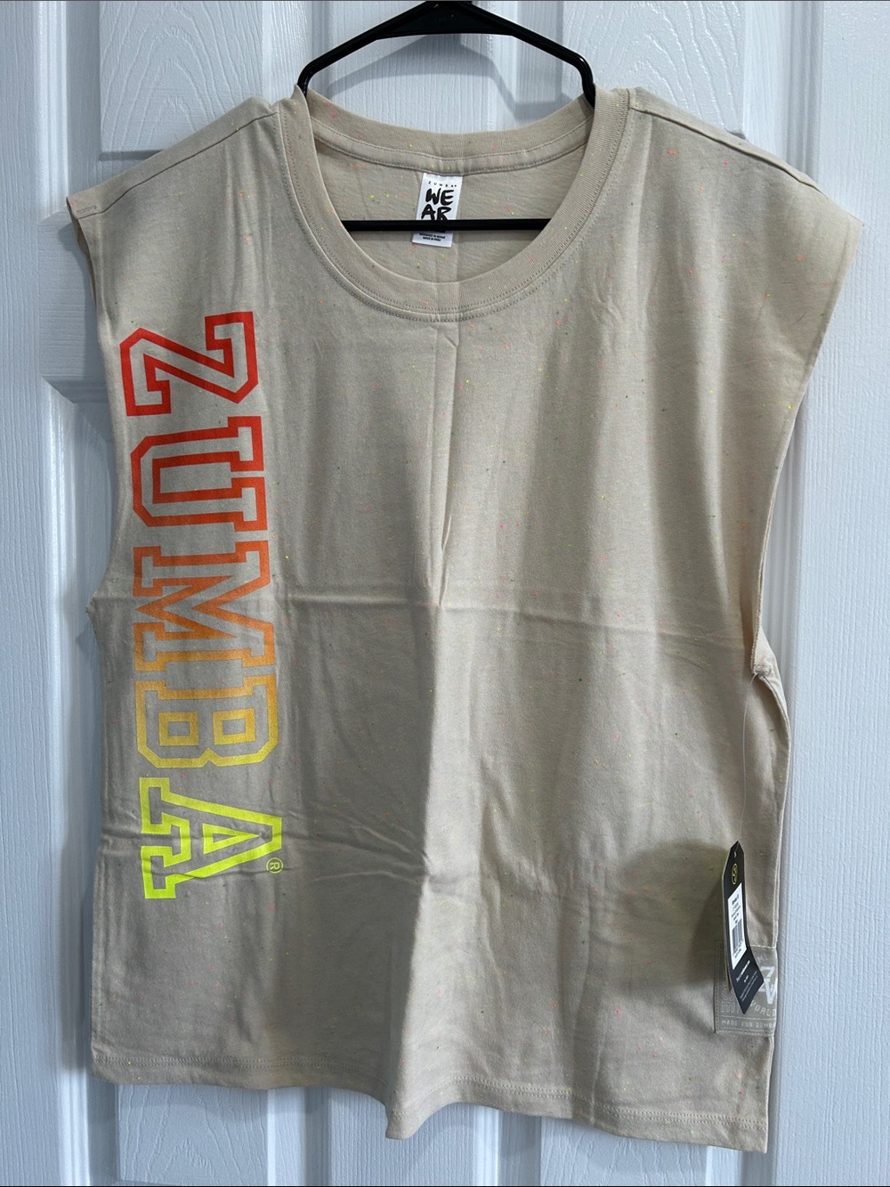 Zumba Fitness Beige Muscle Tee with Red-Orange-Yellow Gradient Logo